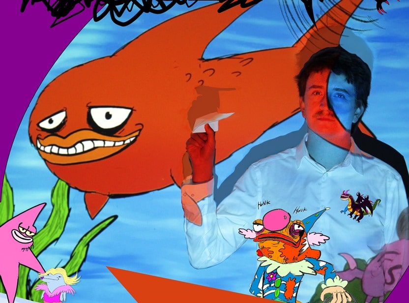 Arco Snr performer with a large red cartoon fish and ocean background