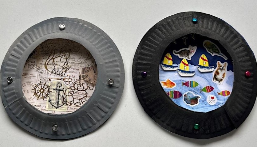 Two child-created artworks that look like portholes with animal scenes inside them, sit side by side