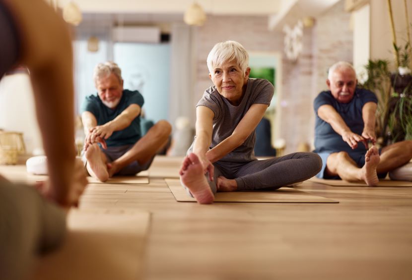 Seniors doing yoga