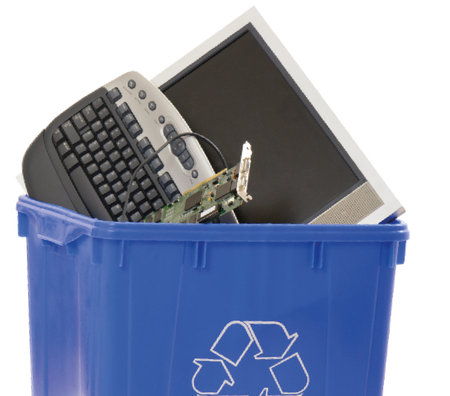 Assorted electronic items in a recycle bin