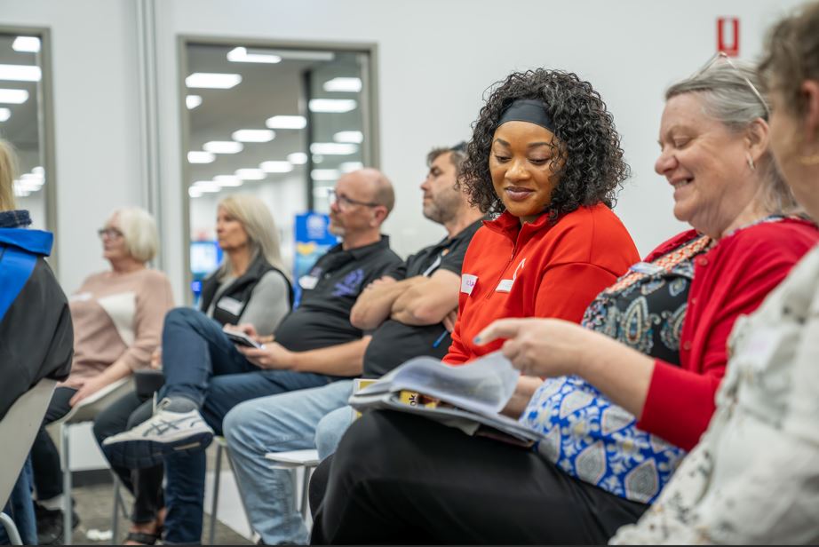 people sitting and sharing ideas