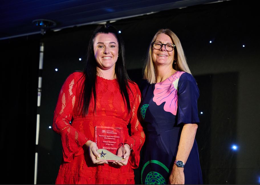 Melanie Loreto and Mayor Caroline Knight smiling for the camera