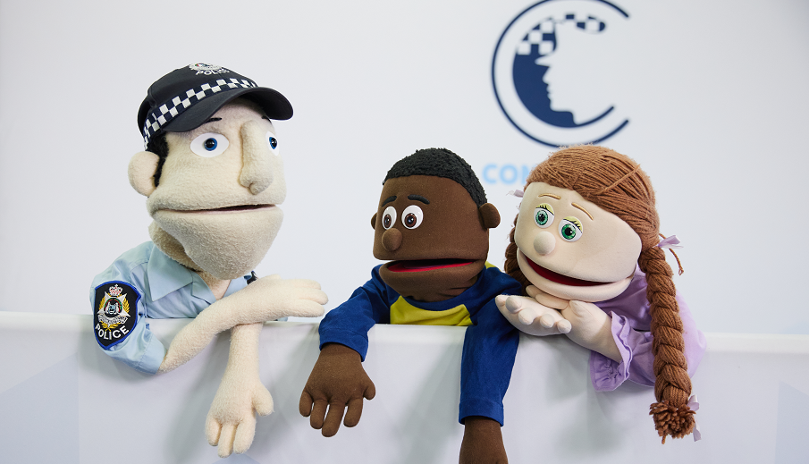 Three Constable Care Puppets in a show