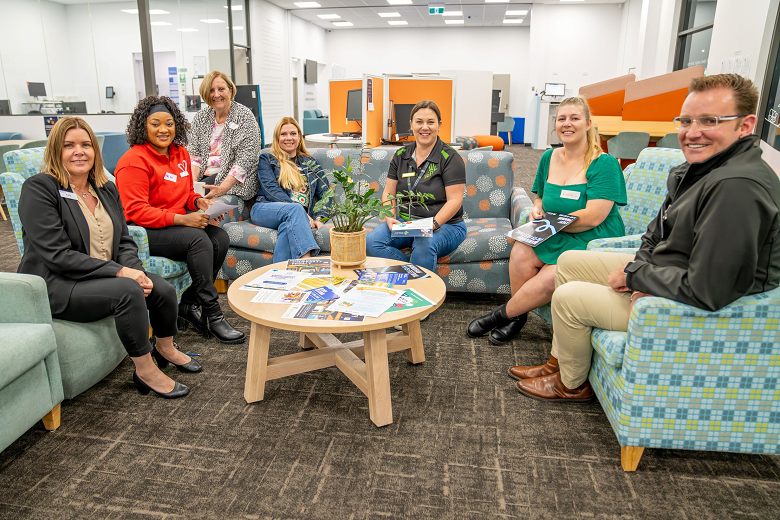 Group of Community workers sitting in the Library