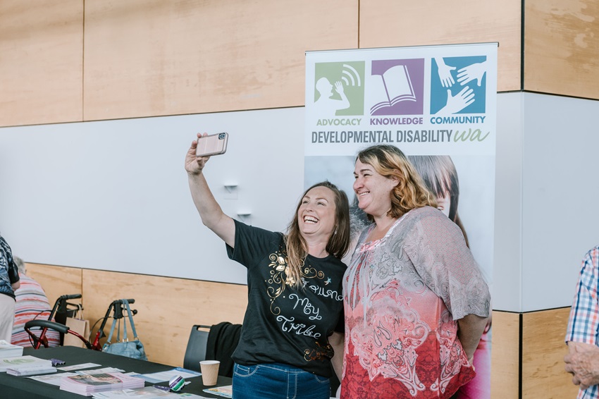 Two Women smiling taking a selfie