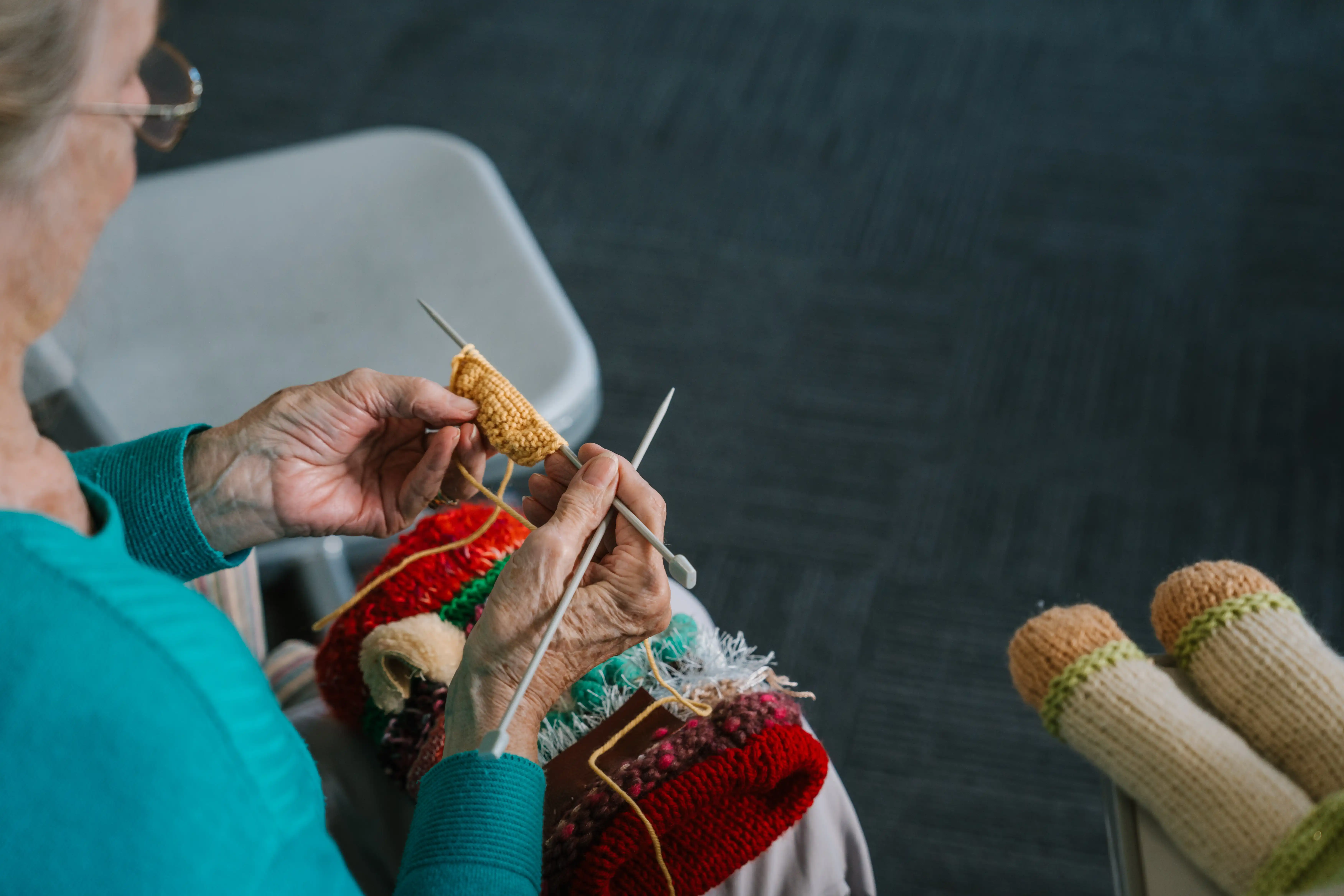 Close up of hands knitting. 
